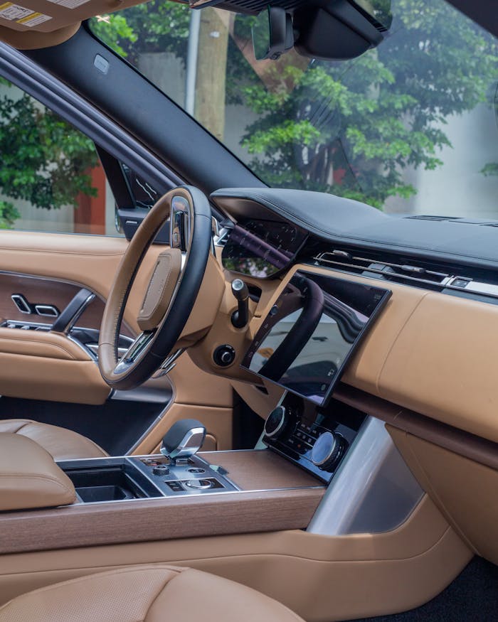 hero-gallery-03 Explore the luxurious interior of a premium SUV featuring modern design and advanced technology.